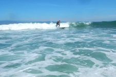 PADDLE SURFING AT BAMBURGH CASTLE