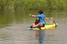 SPEARING CARP FROM A PADDLE BOARD