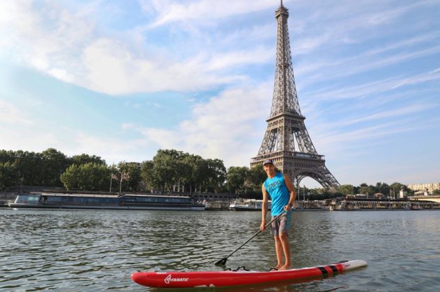 Arthur Arutkin en stand-up paddle sur la Seine, Paris, France, le 29/06/2018.