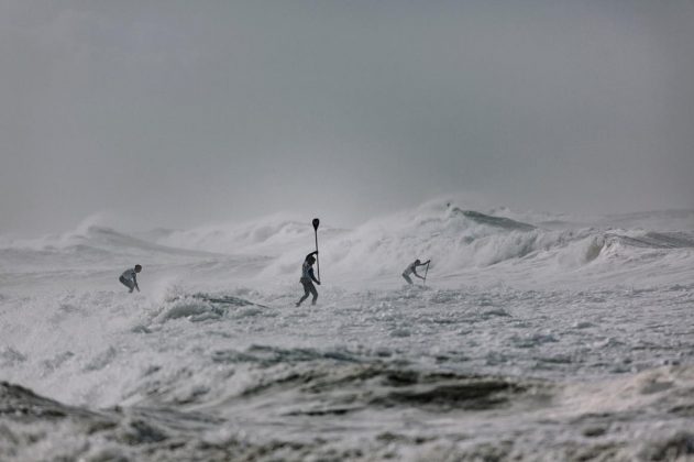 Competitors race at Red Bull Heavy Water Stand Up Paddleboard Race in San Francisco, California, United States on October 20, 2017.